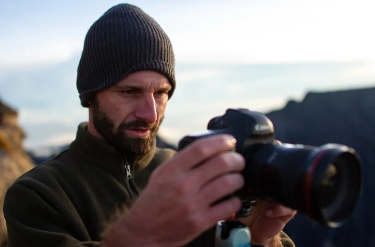Sonny Royal with camera on Mount Kinabalu, Borneo